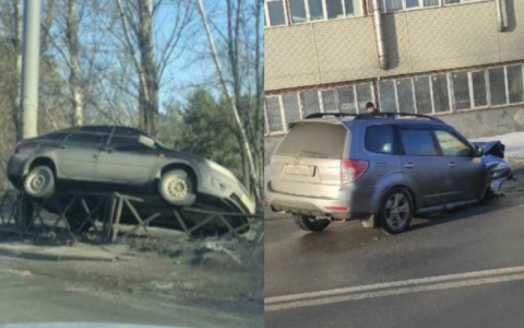 В ДТП в Ярославле одно авто разорвало на запчасти, а другое повисло на заборе. Видео